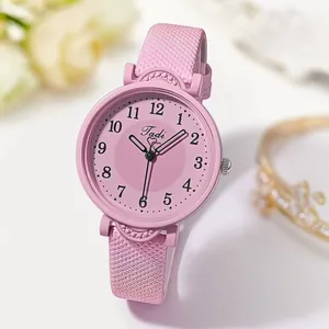 Detailed view of women's pink quartz watch with heart design dial and shimmer strap