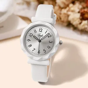 Detail of white leather strap watch with diamond-cut glass and silver sunray dial