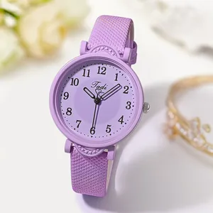 Close-up of a stylish purple women's quartz watch with a matching woven texture strap