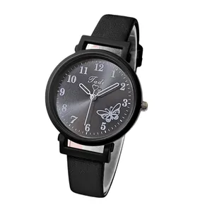 Montre quartz femme avec bracelet en cuir noir, cadran rayon de soleil et motif papillon