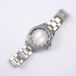Detail of a men's business watch featuring a silver fluted bezel and grey gradient dial