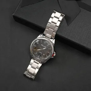 Men's silver quartz watch with grey mesh dial and steel band on a black gift box