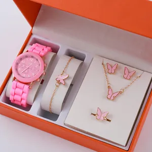 Pink quartz watch and jewelry set with butterfly pendants in a gift box for women