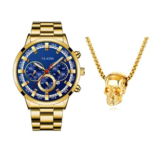 Luxe herenset met gouden stalen horloge blauwe wijzerplaat en schedel hanger ketting goud