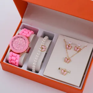 Pink women's quartz watch gift set with silicone strap and butterfly jewelry pieces