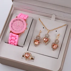 Close-up of pink quartz watch set with matching jewelry in a premium gift box
