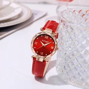 Montre quartz femme avec cadran rouge, boîtier or rose et bracelet en cuir brillant