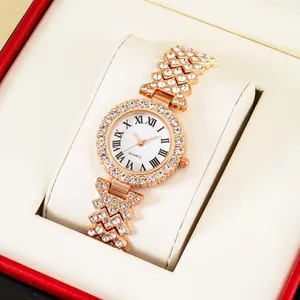 Macro detail of luxury rose gold quartz watch with crystals and Roman numerals in gift box