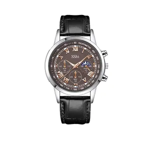 Detailed macro of a business quartz watch with brown sunburst dial and leather strap