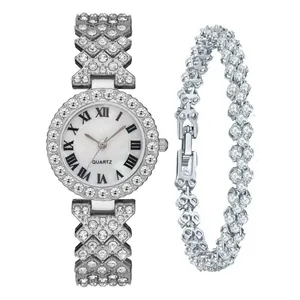 Silver quartz watch and bracelet set with sparkling crystals and Roman numerals