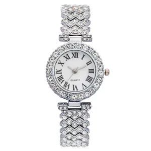 Silver women's quartz watch with crystal-encrusted strap and Roman numeral dial
