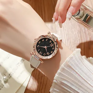 Damenquarzuhr in Roségold mit Seestern-Zifferblatt, weißem Lederarmband und Kristallen
