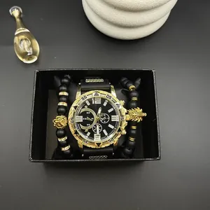 Orologio da uomo in oro con quadrante nero e bracciali con perline in confezione regalo