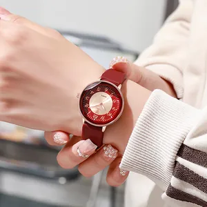 Fashionable red leather quartz watch for women with rose gold case and faceted glass face