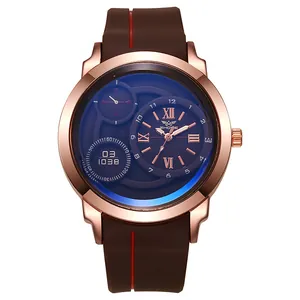 Close-up of rose gold watch case with blue dial and textured brown silicone strap