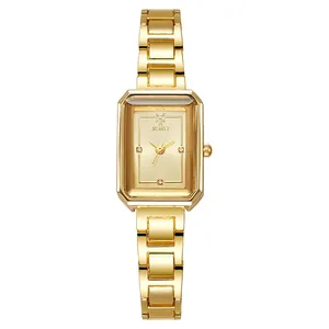 Elegant gold rectangular women's watch with champagne sunburst dial and crystal markers