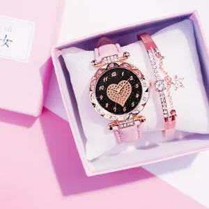 Set orologio donna rosa con quadrante stellato a cuore e bracciale a stella in confezione regalo