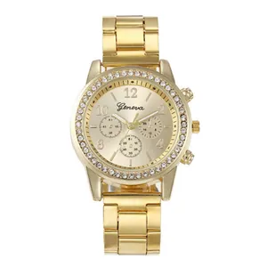 Orologio da donna al quarzo dorato con lunetta in strass e quadranti decorativi su bianco