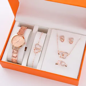 Close-up of a 5-piece rose gold women's watch set with heart-shaped jewelry and crystals