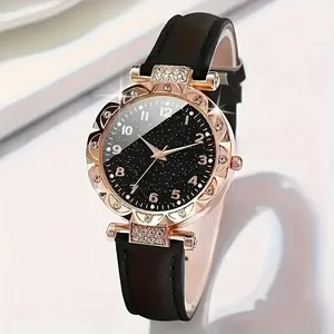 Montre élégante pour femme en cuir noir avec cadran étoilé et lunette en strass