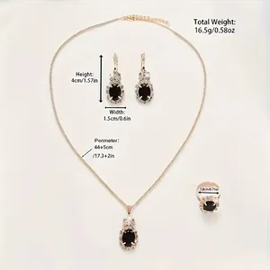 Parure de bijoux argentée élégante avec pierres ovales noires et perles de métal