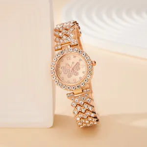 Rose gold women's watch with butterfly dial and full crystal stones on bezel and band
