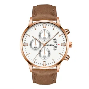 Macro detail of rose gold watch face with white dial and brown leather strap