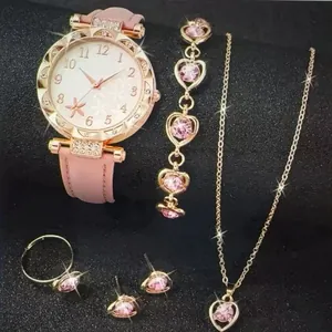 5-delige roségouden horloge- en sieradenset met roze stenen op zwarte achtergrond