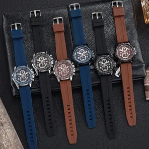 Detailed close-up showing men's quartz sports watches with silicone straps in various colors