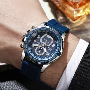 Men's quartz sports watch with blue silicone strap and chronograph dial on wrist
