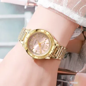 Elegant women's gold quartz watch with pink diamond dial and rhinestone bracelet