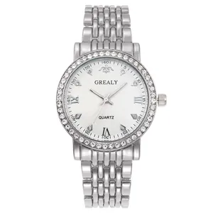 Detailed view of silver quartz watch with rhinestone bezel and textured sunray dial