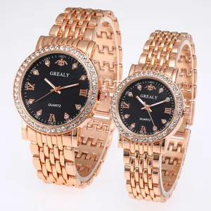 Detailed view of rose gold quartz watch set with diamond bezel and black dial