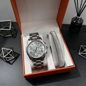 Silver stainless steel chronograph watch and metal woven bracelet in an orange gift box