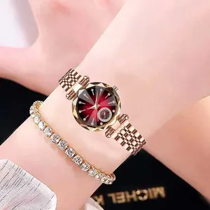 Coffret montre femme or rose avec cadran rouge foncé et bracelet en strass brillant