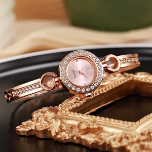Elegant rose gold women's bracelet watch featuring sparkling crystals and a quartz movement