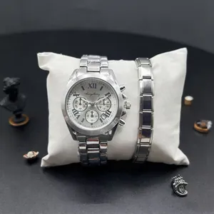 Close-up of silver multifunction chronograph watch and matching link bracelet on display