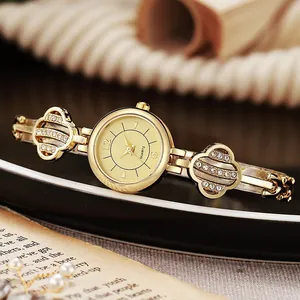 Elegant gold quartz bracelet watch for women with clover-shaped crystal-set links