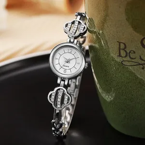 Women's quartz watch featuring silver clover bracelet strap with sparkling rhinestones