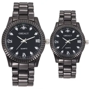 Matching pair of black quartz watches with diamond accents and steel mesh bands