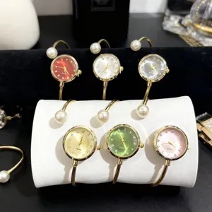 Montre Bracelet Élégante Pour Femmes En Alliage Décoration De Künstliche Perles Cadran En Strass Montre À Quartz Pour Bijoux De Fête Quotidienne