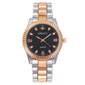 Detailed macro of the black dial with rose gold fluted bezel and diamond hour markers