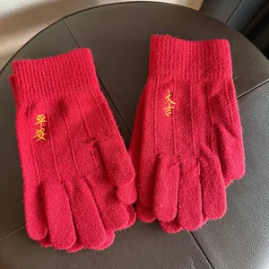 Red knit winter gloves for women with embroidered gold Chinese characters for luck