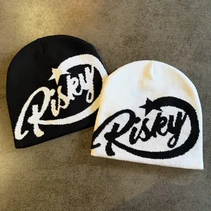 Hip hop jacquard knit beanie featuring Risky lettering and star patterns in black and white