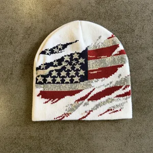 Flat lay of a distressed American flag jacquard knit beanie for winter warmth
