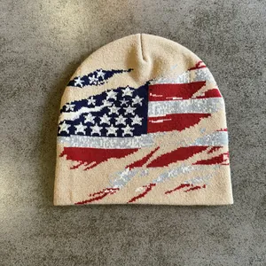 Detailed knit texture of American flag beanie with distressed star pattern in khaki