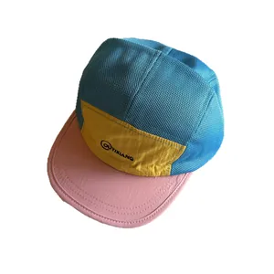 Three-color mesh panel cap in blue, yellow and pink with outdoor camp style branding