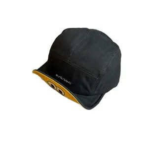 Black cotton 5-panel baseball cap with cute cartoon eyes and yellow trim details