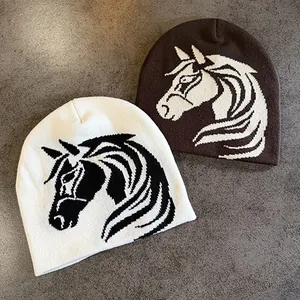 Knitted beanie hat featuring a stylish horse jacquard pattern in two color variants