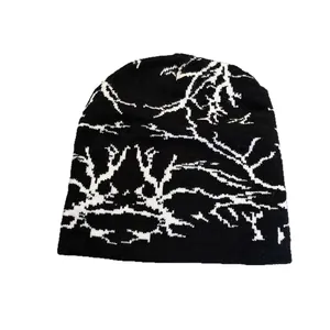 Schwarz-weiße Jacquard-Strickmütze mit abstraktem Knochenmuster für Herbst und Winter